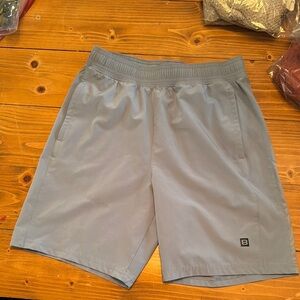 Gray Athletic Shorts with Elastic Waistband and Performance Fabric
